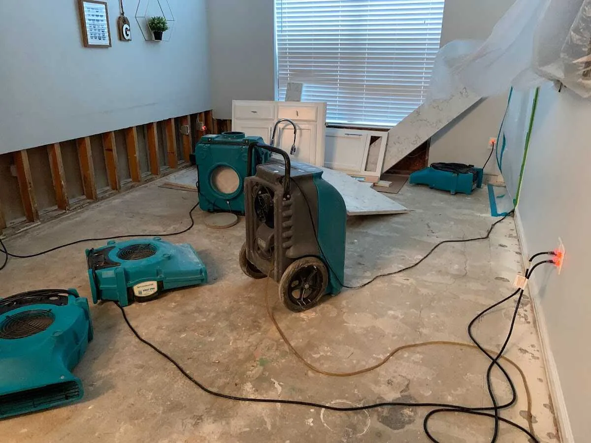 Dehumidifier in flood-cut room for Water Damage Restoration in Richardson
